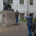 315-0602 Posing with Statue of John Harvard.jpg
